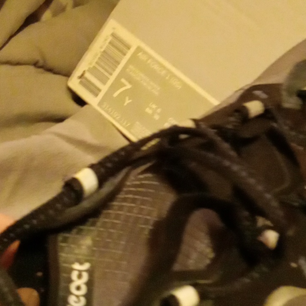 A nice 7 youth running shoe Midtop Nike brand slightly worn but still like now